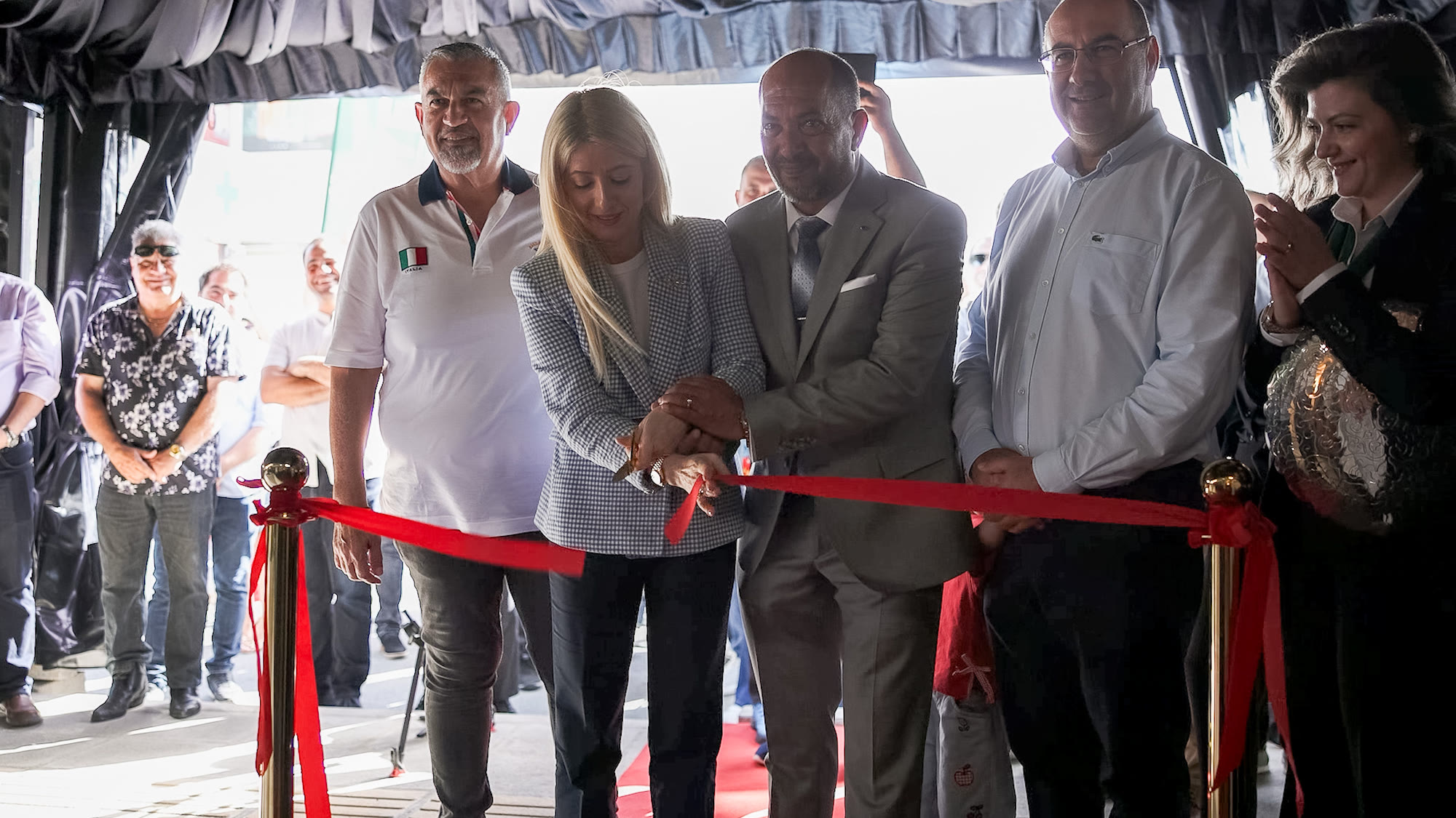 Ribbon-cutting ceremony at the El Sayed grand opening